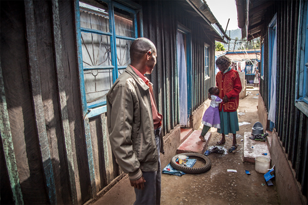 Mugendi’s daughter Diana runs out to give her mother a hug before she walks the visitors out to say goodbye. Mugendi, his wife and two children, currently rent this house in town, but are hoping to one day build a home on the plot of land they have received.