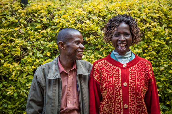 Pastor Mugendi and his wife, Esther. Pastor Titus Kimathi was standing off to the side and as they went to smile for the picture shouted, “Give her a big smooch!” This was their reaction.